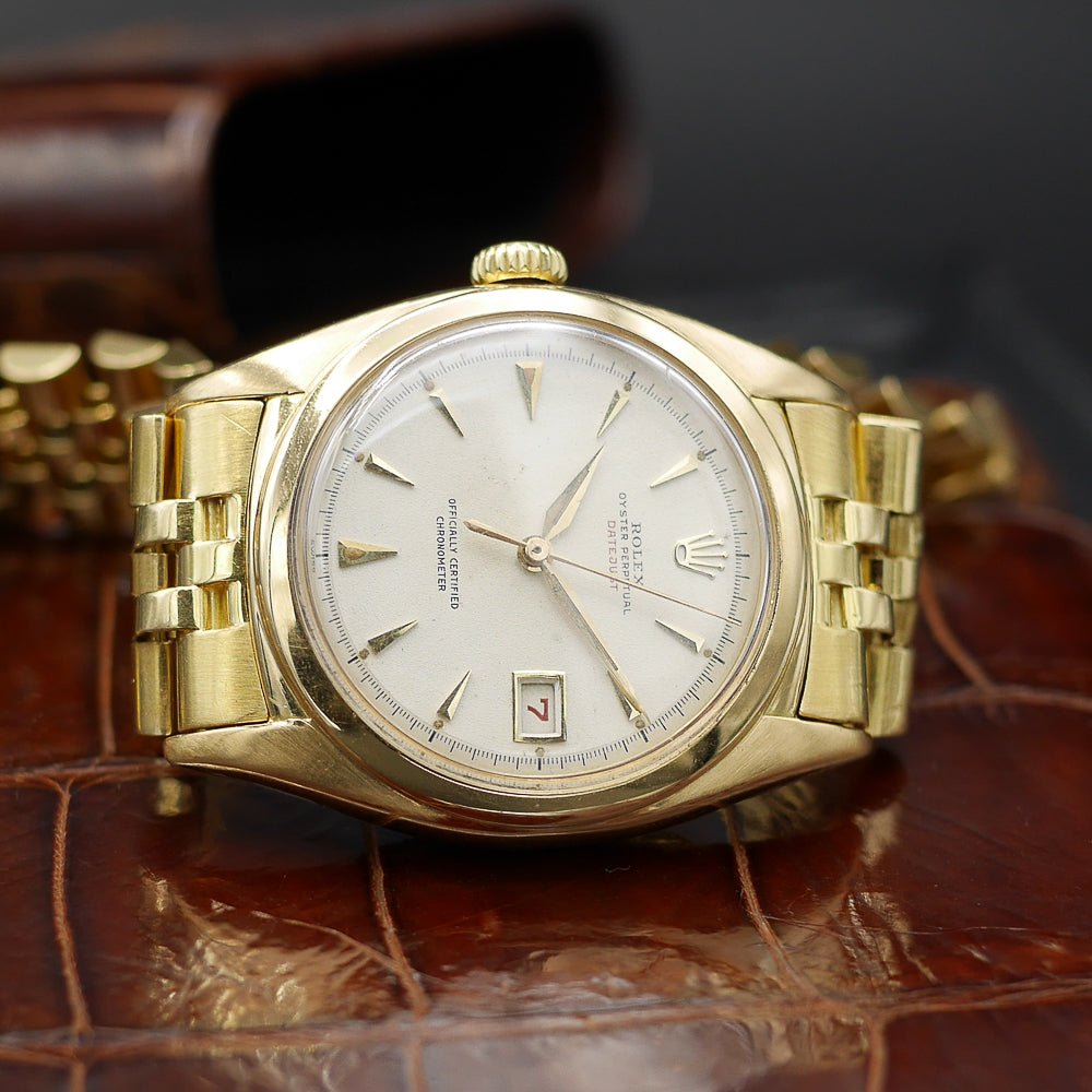Rolex Oyster Perpetual Date Just Ref: 6104 in Yellow gold. Circa: 1961.