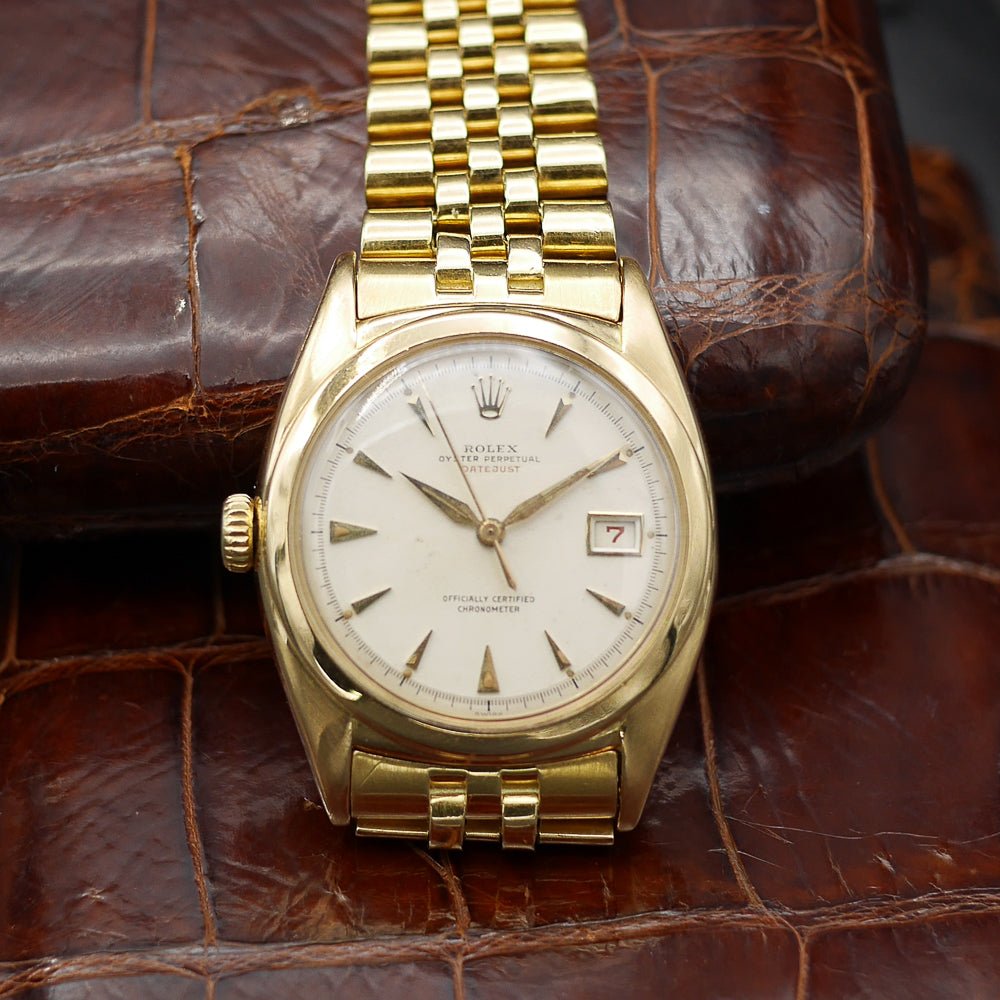 Rolex Oyster Perpetual Date Just Ref: 6104 in Yellow gold. Circa: 1961.