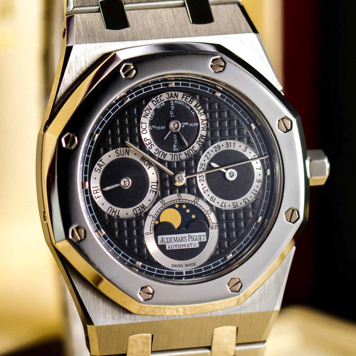 Audemars Piguet Royal Oak Ref. 25820SP, 39mm stainless steel case with platinum bezel, silver “Tapisserie” dial, and integrated bracelet.