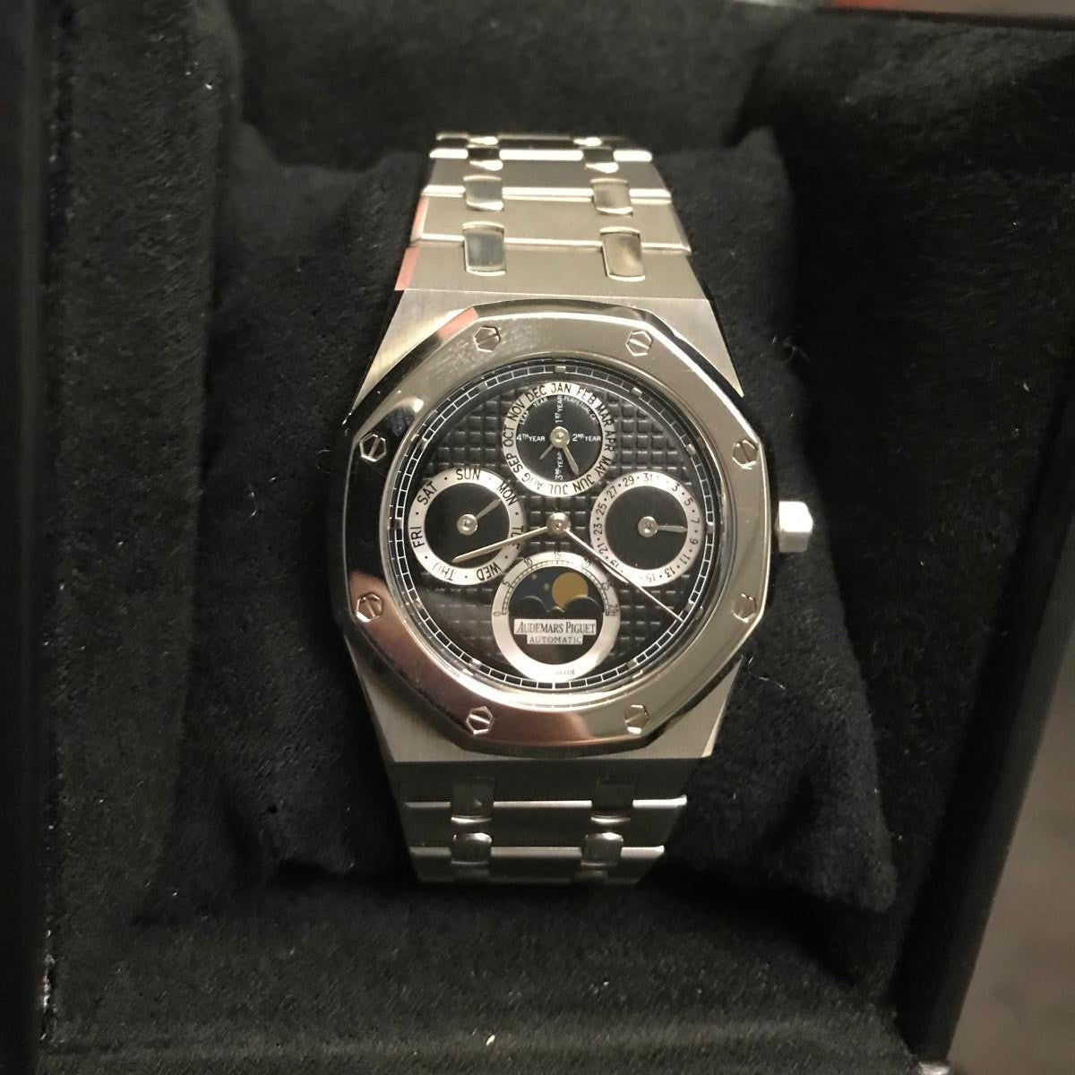 Audemars Piguet Royal Oak Ref. 25820SP, 39mm stainless steel case with platinum bezel, silver “Tapisserie” dial, and integrated bracelet.