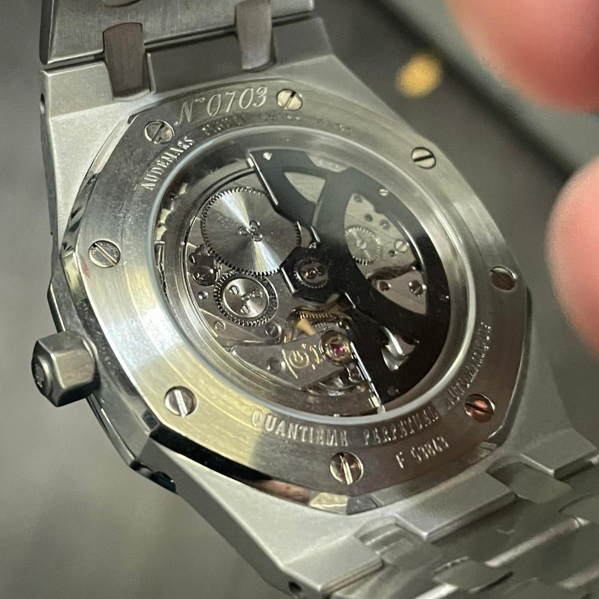 Audemars Piguet Royal Oak Ref. 25820SP, 39mm stainless steel case with platinum bezel, silver “Tapisserie” dial, and integrated bracelet.