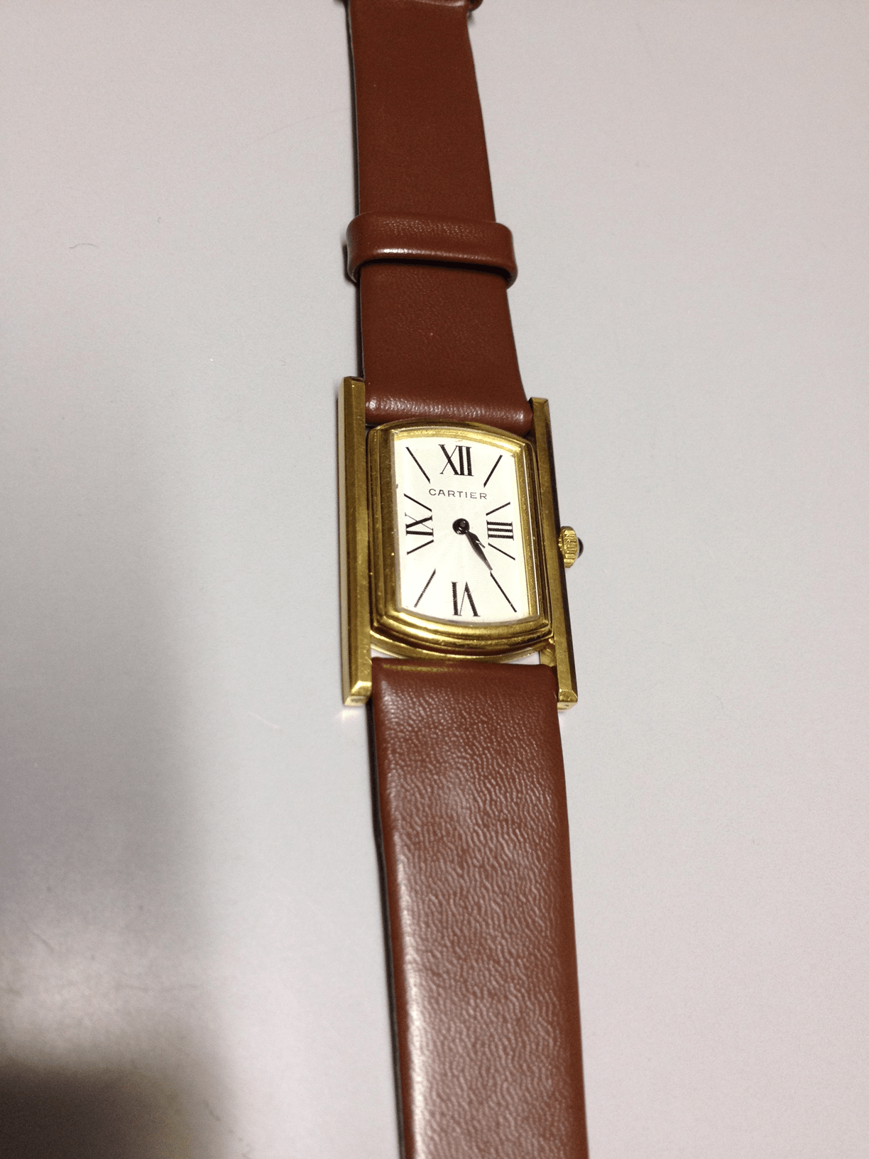 Cartier Tank Cabriolet in Yellow gold. Circa: 1960.