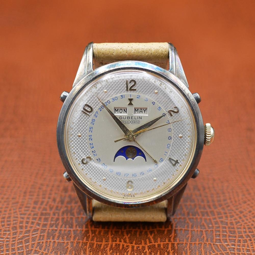 Gubelin Triple Calendar Moon Phase, yellow gold, guilloché dial, vintage Swiss craftsmanship, circa 1950.