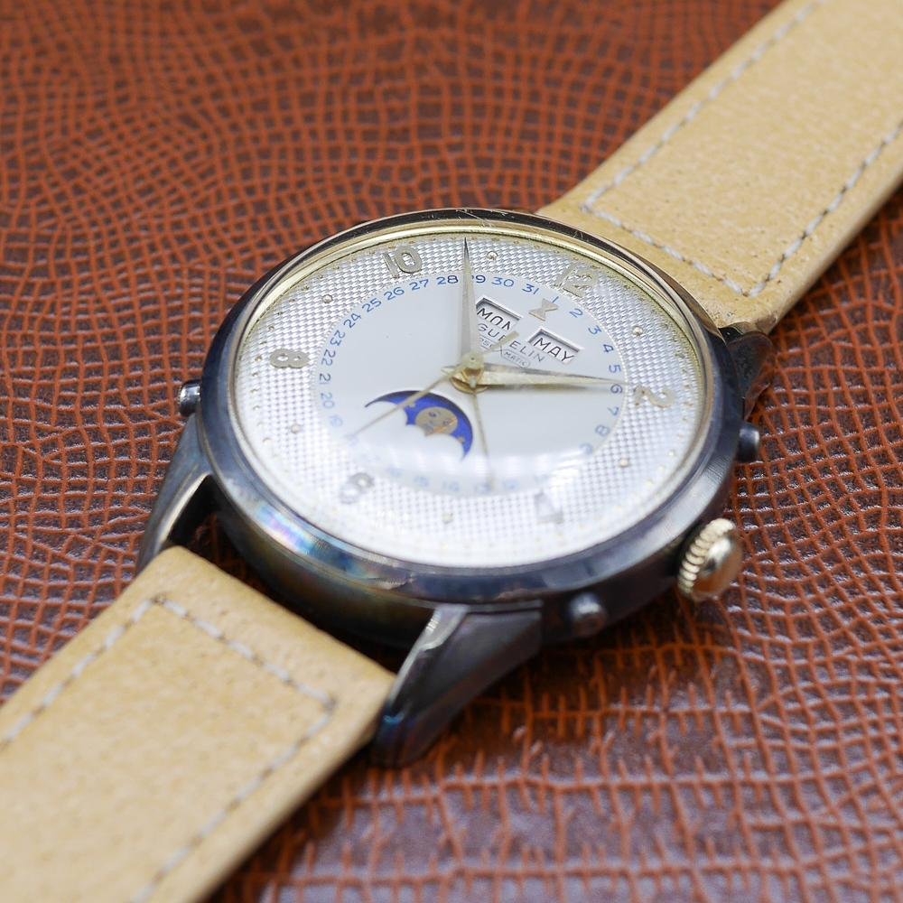 Gubelin Triple Calendar Moon Phase, yellow gold, guilloché dial, vintage Swiss craftsmanship, circa 1950.