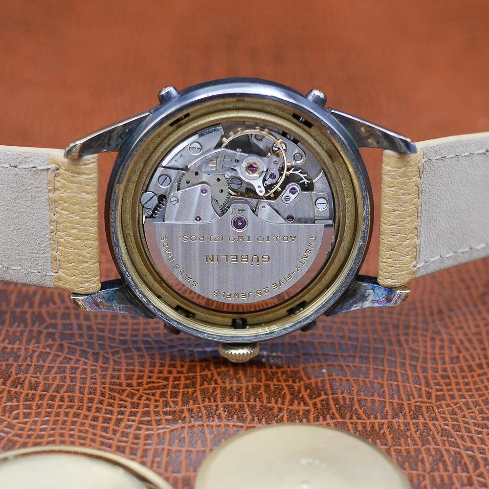 Gubelin Triple Calendar Moon Phase, yellow gold, guilloché dial, vintage Swiss craftsmanship, circa 1950.