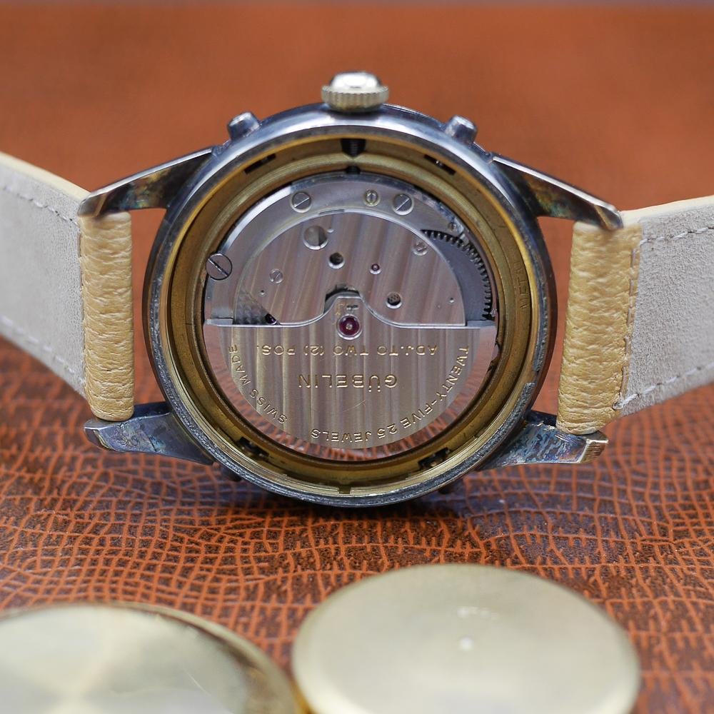 Gubelin Triple Calendar Moon Phase, yellow gold, guilloché dial, vintage Swiss craftsmanship, circa 1950.