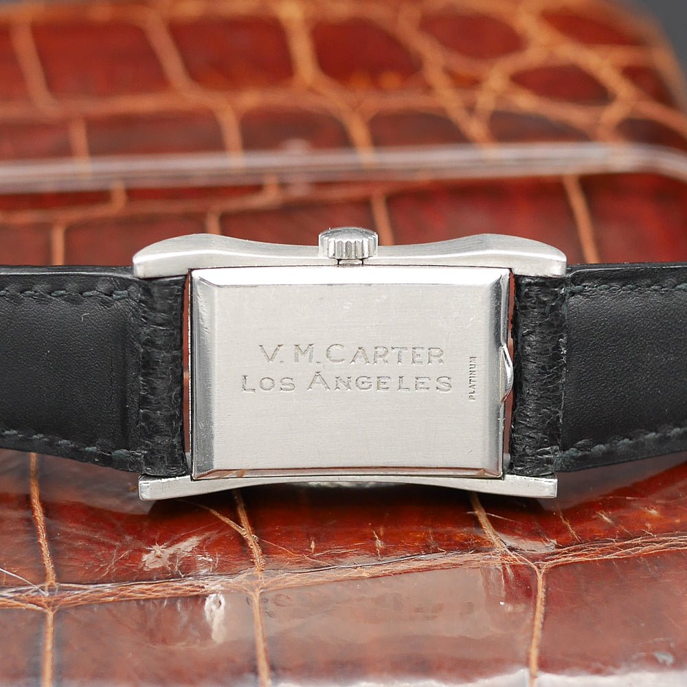 Patek Philippe Hour Glass Ref. 2456, platinum case, 29x22mm, circa 1945, rare vintage watch with diamond minute dots.