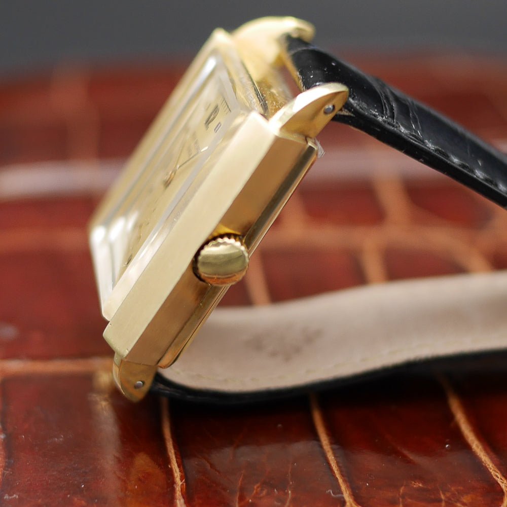 Patek Philippe Ref. 2425 in yellow gold, circa 1947, 32x26mm, featuring a pink gold dial, applied numerals, and teardrop lugs.