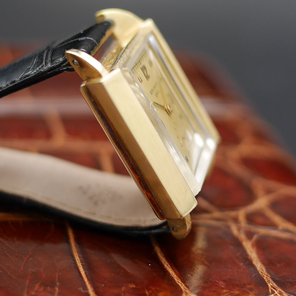 Patek Philippe Ref. 2425 in yellow gold, circa 1947, 32x26mm, featuring a pink gold dial, applied numerals, and teardrop lugs.