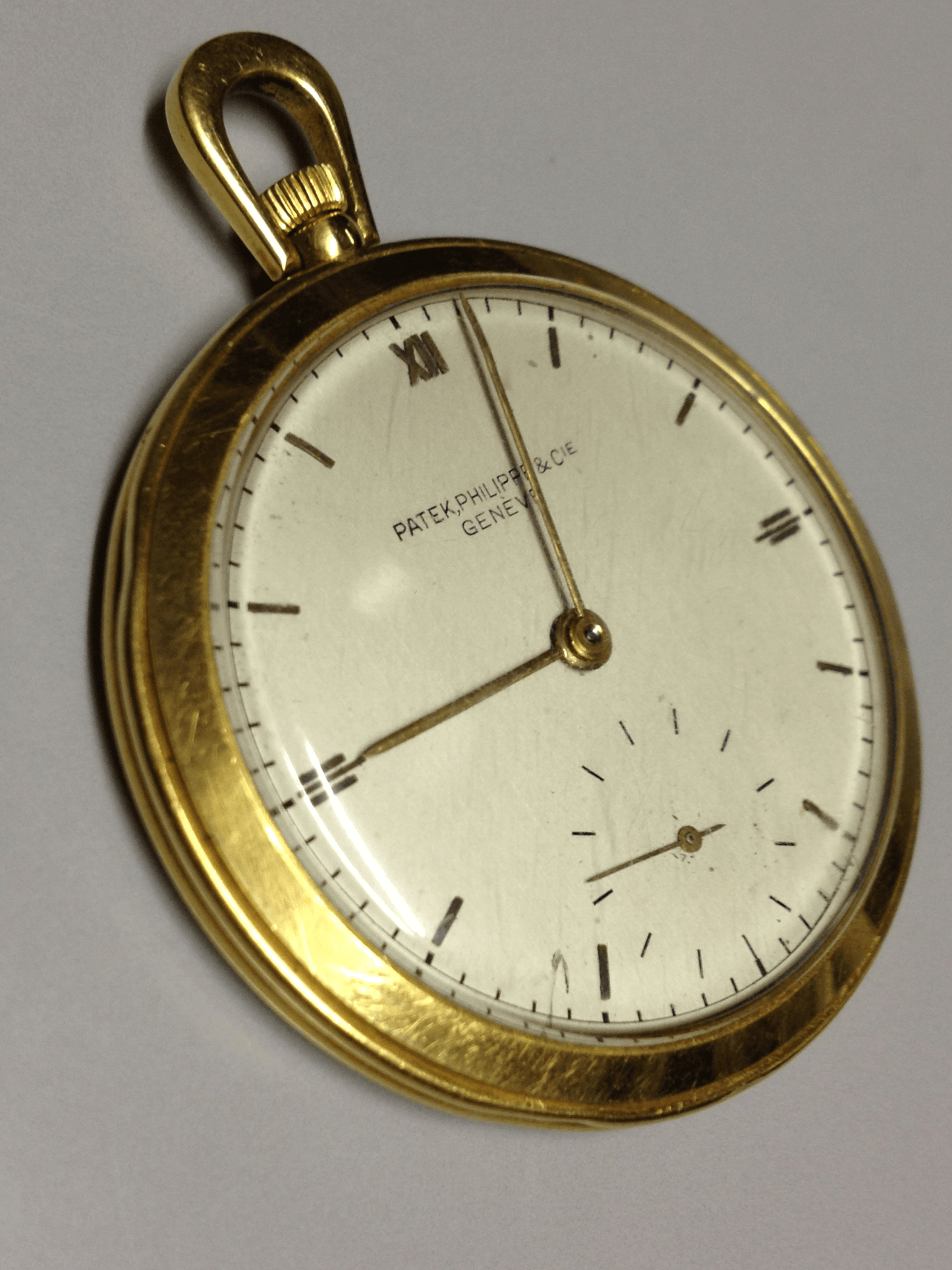 Vintage Patek Philippe pocket watch in yellow gold, circa 1940, featuring a small seconds subdial at 6 o’clock.