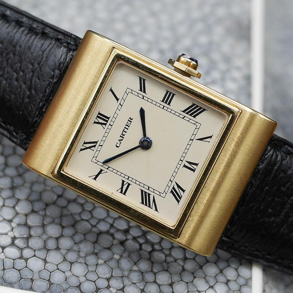 Cartier tank in Yellow gold. Circa: 1960.