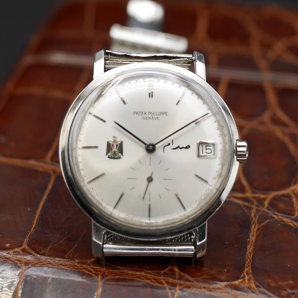 Patek Philippe Calatrava Ref 3445, white gold, circa 1960. Featuring Egypt’s coat of arms, silver dial, and the first automatic date movement.