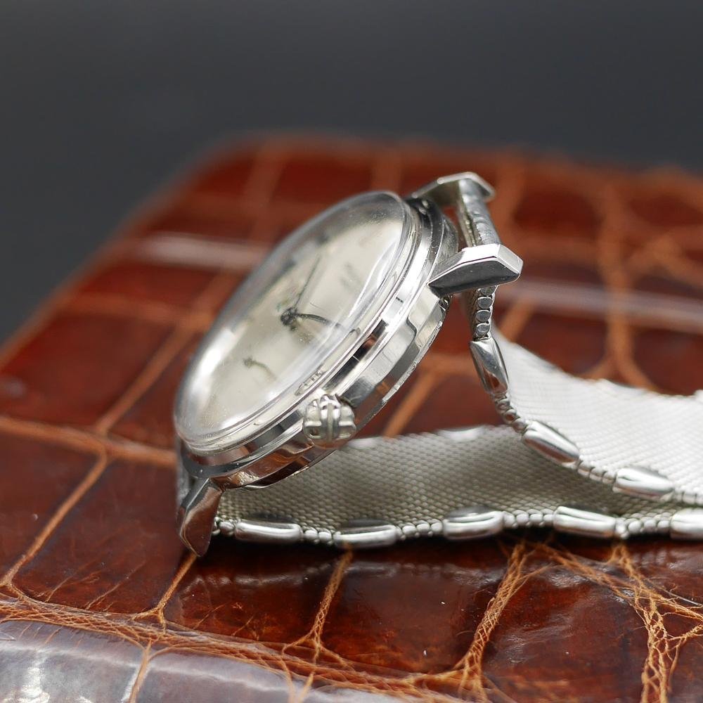 Patek Philippe Calatrava Ref 3445, white gold, circa 1960. Featuring Egypt’s coat of arms, silver dial, and the first automatic date movement.