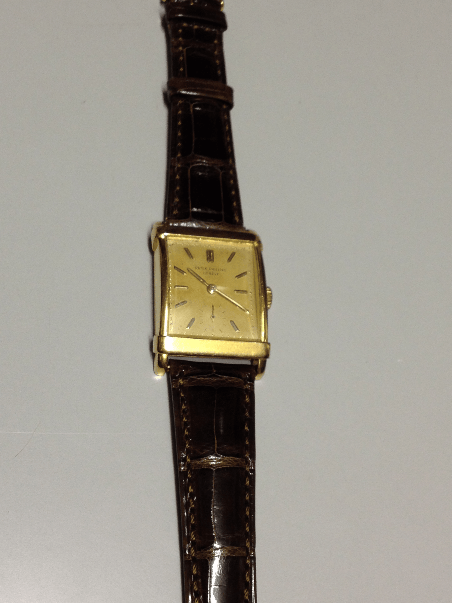 Patek Philippe Rectangular Wristwatch with an amazing patina, Ref 2531 in Yellow Gold, Circa 1950.
