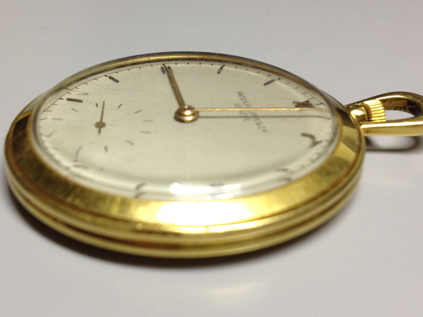 Vintage Patek Philippe pocket watch in yellow gold, circa 1940, featuring a small seconds subdial at 6 o’clock.
