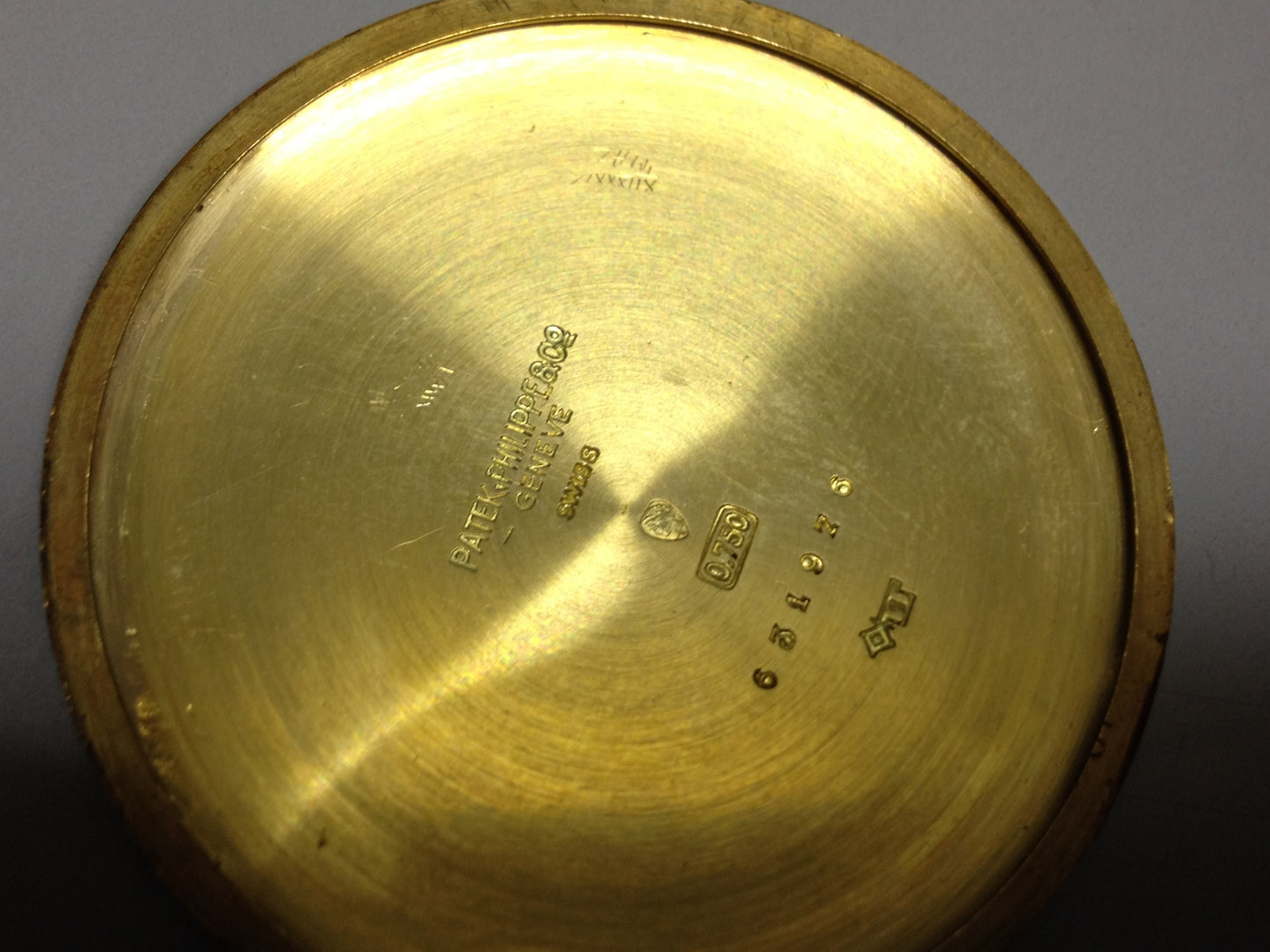 Vintage Patek Philippe pocket watch in yellow gold, circa 1940, featuring a small seconds subdial at 6 o’clock.