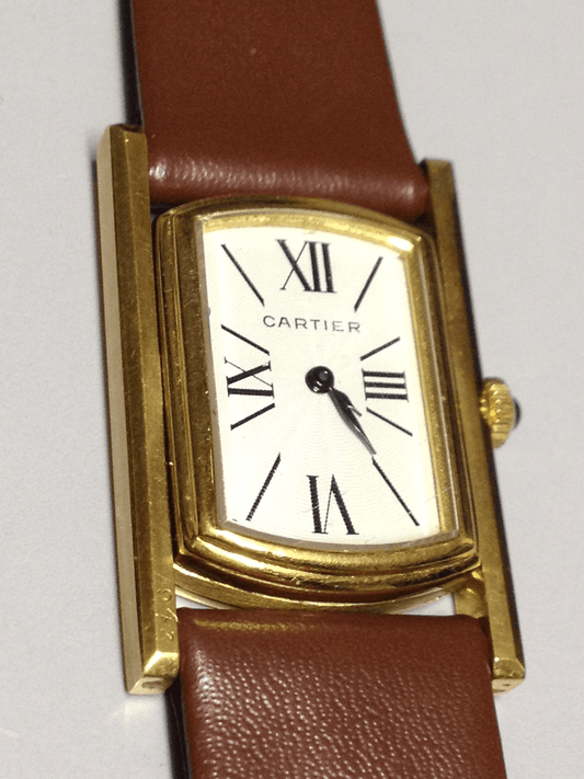 Cartier Tank Cabriolet in Yellow gold. Circa: 1960.