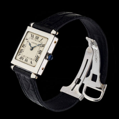Cartier Tank Obus 1926 in platinum, featuring a rare square case and Art Deco-inspired design. A highly collectible vintage Cartier masterpiece.