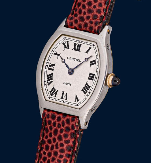 Cartier Tortue Platinum 1916 – A rare vintage luxury watch with timeless elegance.