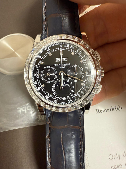 Patek Philippe Ref. 5971 Platinum, perpetual calendar chronograph with baguette diamond bezel. 2010 example with Letter of Archives & extra platinum caseback.