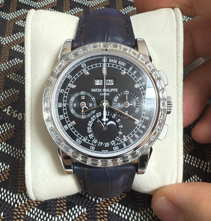 Patek Philippe Ref. 5971 Platinum, perpetual calendar chronograph with baguette diamond bezel. 2010 example with Letter of Archives & extra platinum caseback.