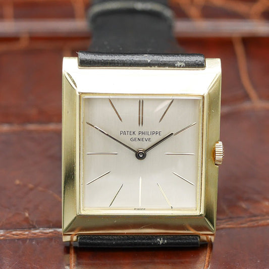 Patek Philippe square watch in yellow gold, circa 1960, featuring a timeless design and manual-winding movement.