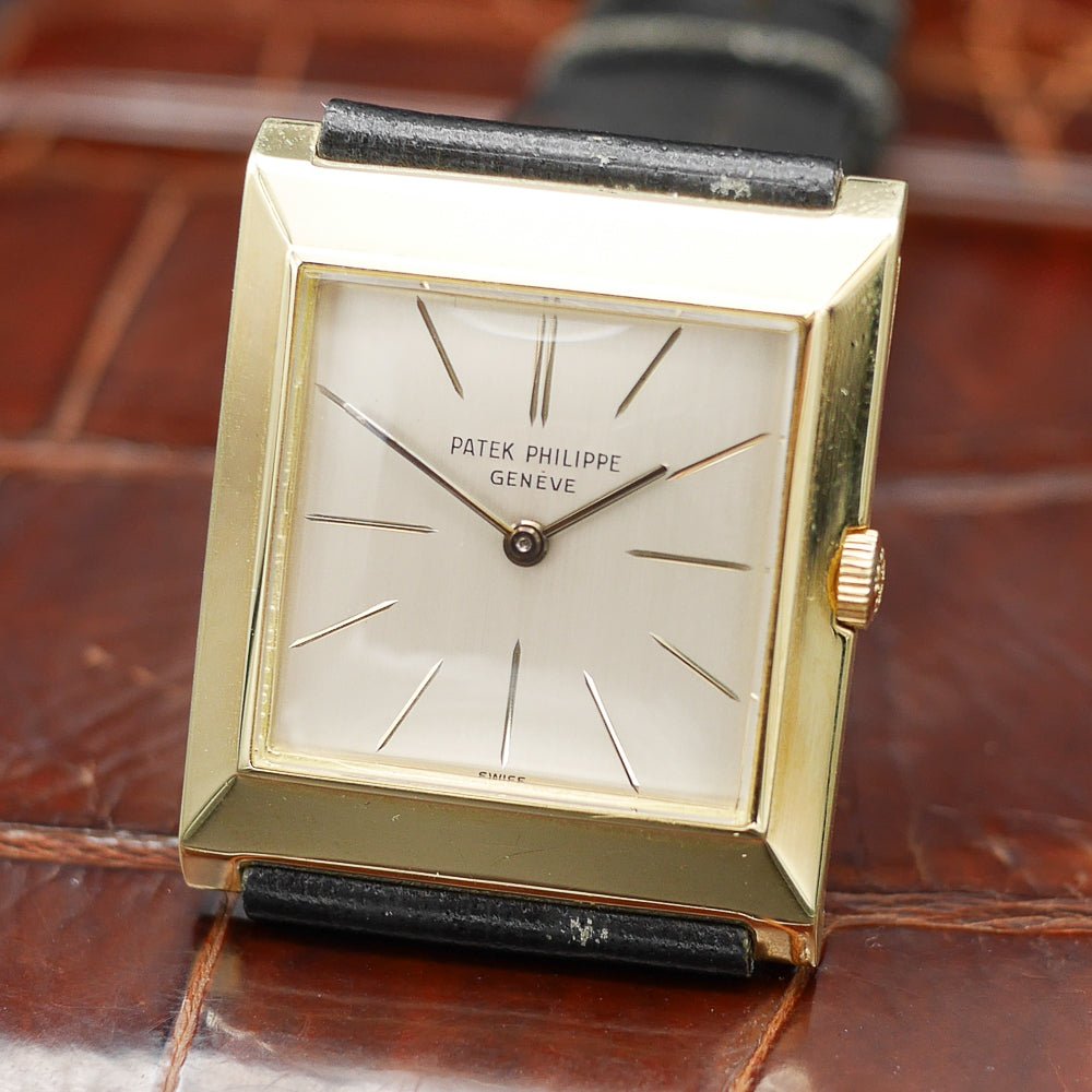 Patek Philippe square watch in yellow gold, circa 1960, featuring a timeless design and manual-winding movement.