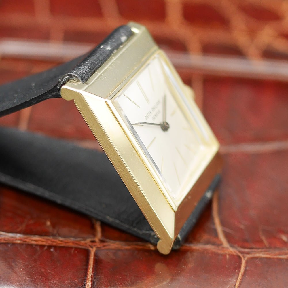 Patek Philippe square watch in yellow gold, circa 1960, featuring a timeless design and manual-winding movement.