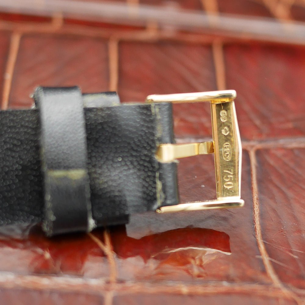 Patek Philippe square watch in yellow gold, circa 1960, featuring a timeless design and manual-winding movement.