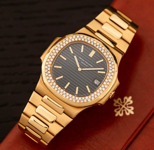 Patek Philippe Nautilus Ref. 3700/013 — 18kt Yellow Gold, Diamond Bezel