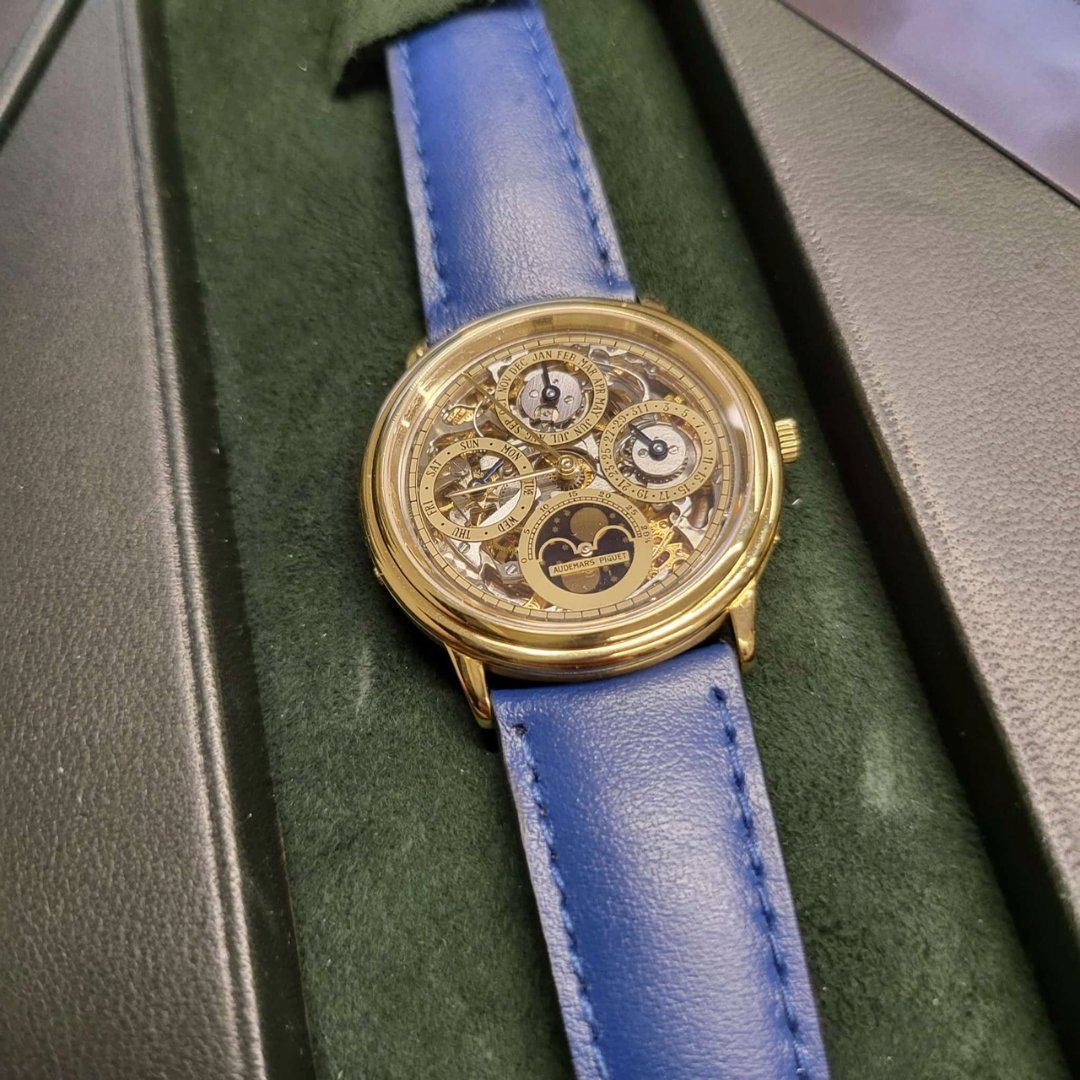 Audemars Piguet Perpetual Calendar Ref. 5558BA in 18k yellow gold from 1982, featuring a skeletonized dial and perpetual calendar complications.
