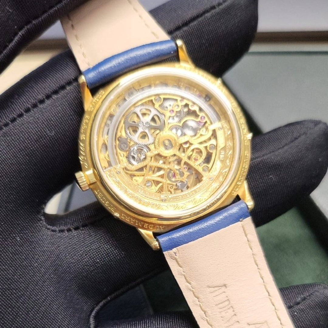 Audemars Piguet Perpetual Calendar Ref. 5558BA in 18k yellow gold from 1982, featuring a skeletonized dial and perpetual calendar complications.