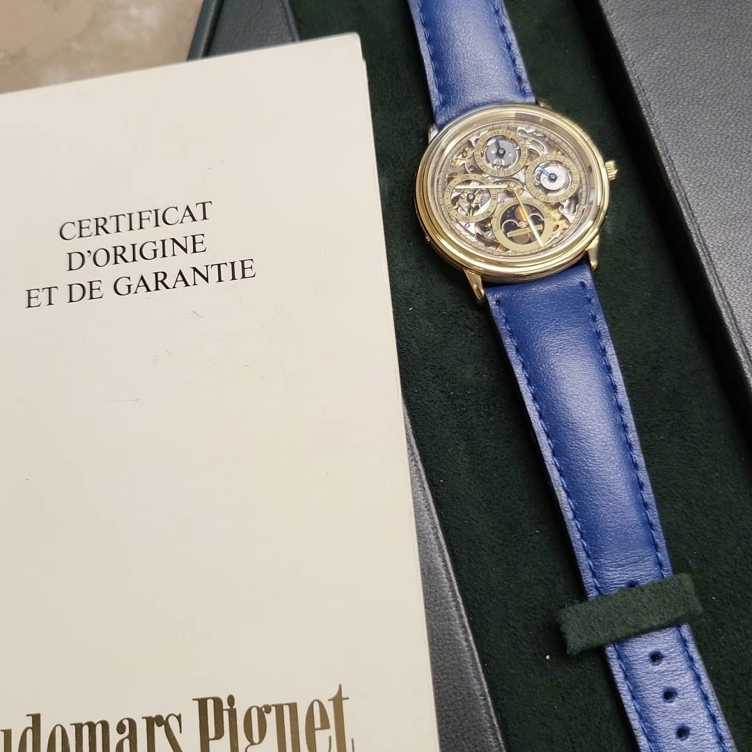 Audemars Piguet Perpetual Calendar Ref. 5558BA in 18k yellow gold from 1982, featuring a skeletonized dial and perpetual calendar complications.