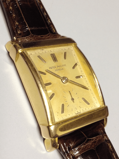 Patek Philippe Rectangular Wristwatch with an amazing patina, Ref 2531 in Yellow Gold, Circa 1950.