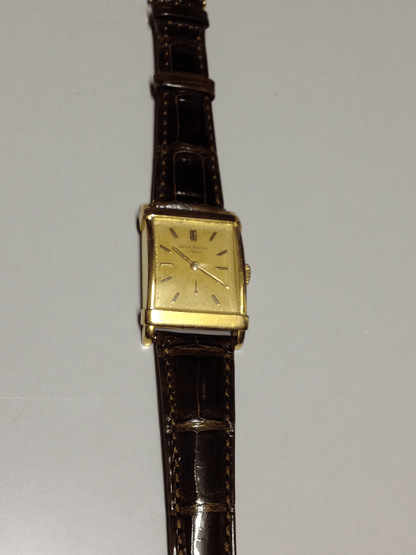 Patek Philippe Rectangular Wristwatch with an amazing patina, Ref 2531 in Yellow Gold, Circa 1950.