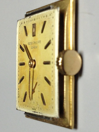 Patek Philippe Rectangular Wristwatch with an amazing patina, Ref 2531 in Yellow Gold, Circa 1950.