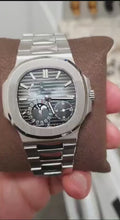 Load and play video in Gallery viewer, Patek Philippe Nautilus REF: 5712/A-001 in Stainless Steel from 2019
