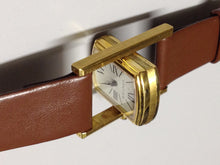 Load image into Gallery viewer, Cartier Tank Cabriolet in Yellow gold. Circa: 1960.
