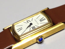 Load image into Gallery viewer, Cartier Tank Cabriolet in Yellow gold. Circa: 1960.
