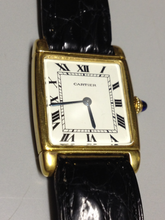 Load image into Gallery viewer, Cartier Tank with fold over case in Yellow gold. Circa: 1960.
