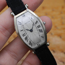 Load image into Gallery viewer, Cartier Tonneau in Yellow and White gold. Circa: 1915.
